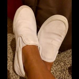Vans off the Wall white slip ons